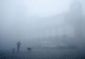 New Gallery: A man walks on a street on a foggy day in Sighnaghi