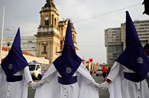 Men take part in a Procession of Jesus Nazareno de Candelaria Cristo Rey in the streets Men take part in a Procession of Jesus Nazareno de Candelaria Cristo Rey in the streets