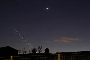 Images Dated 27th April 2015: A meteorite creates a streak of light across the night sky over the North Yorkshire