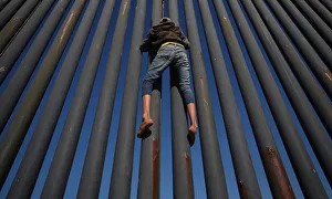 Tijuana Gallery: A migrant, part of a caravan of thousands from Central America trying to reach the United