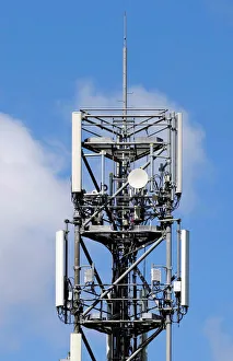 Mobile telecom transmitter relays and antenna are seen on the roof of a building in Mobile telecom transmitter relays and antenna are seen on the roof of a building in