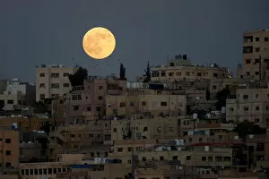 Power Of Nature Gallery: The moon is seen before a lunar eclipse over Amman