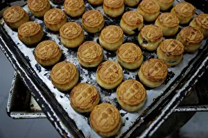 Mooncakes with Chinese words Support each other are seen at Wah Yee Tang Bakery in Hong Mooncakes with Chinese words Support each other are seen at Wah Yee Tang Bakery in Hong