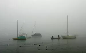 Images Dated 11th October 2005: Moored boats are pictured on a foggy autumn morning at lake Ammersee in Herrsching