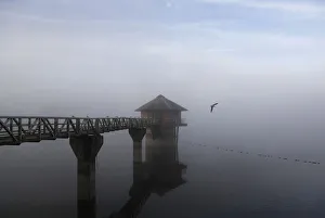 Morning mist sits over the Cropston Reservoir in Britain Morning mist sits over the Cropston Reservoir in Britain