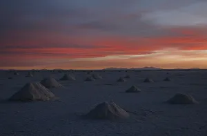 Mounds of salt formed by miners sit on the Salar de Uyuni, the worlds biggest salt desert Mounds of salt formed by miners sit on the Salar de Uyuni, the worlds biggest salt desert
