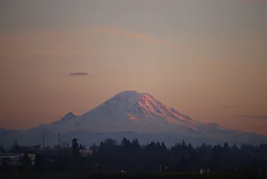 Mount Rainier is pictured as the last rays of sunlight hit its western side, taken Mount Rainier is pictured as the last rays of sunlight hit its western side, taken