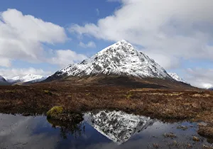 The mountain Buachaille Etive Mor is reflected in water near Ballachulish, Scotland The mountain Buachaille Etive Mor is reflected in water near Ballachulish, Scotland