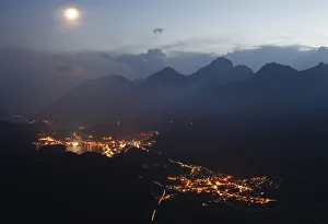 A night view taken from the Muottas Muragl mountain shows the Swiss mountain resort of St A night view taken from the Muottas Muragl mountain shows the Swiss mountain resort of St