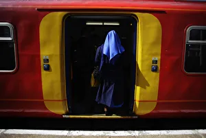 Twickenham Gallery: A nun boards a train at Strawberry Hill station following Pope Benedict XVIs arrival