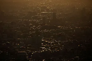 Office and residential buildings are silhouetted in the dusk from the observation Office and residential buildings are silhouetted in the dusk from the observation