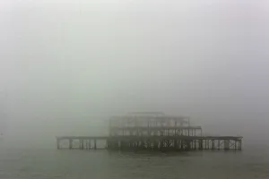 The old west pier is seen on a foggy day in Brighton The old west pier is seen on a foggy day in Brighton