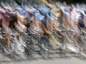 The pack of riders cycle at the start of the fifth stage of the Tour de Suisse cycling The pack of riders cycle at the start of the fifth stage of the Tour de Suisse cycling