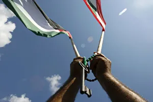 A Palestinian carries a symbolic key during a protest in Beirut A Palestinian carries a symbolic key during a protest in Beirut