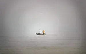 A Palestinian fisherman rows his fishing boat near the Jewish settlement of Shirat A Palestinian fisherman rows his fishing boat near the Jewish settlement of Shirat
