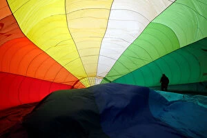 Images Dated 27th January 2018: A Participant prepares a balloon for inflation during the International Hot Air Balloon