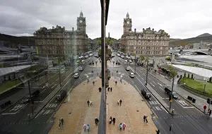 Pedestrians walk along Princes Street, the main shopping street in Edinburgh Pedestrians walk along Princes Street, the main shopping street in Edinburgh