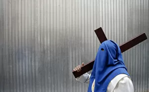 Images Dated 20th April 2011: A penitent of El Prendimiento brotherhood takes part in a procession during Holy Week