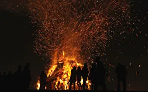 People attend a party held during the night of San Juan bonfire on the beach of Playa de People attend a party held during the night of San Juan bonfire on the beach of Playa de