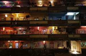 Images Dated 3rd November 2013: People decorate their houses with lanterns and lights as they celebrate Diwali in Mumbai