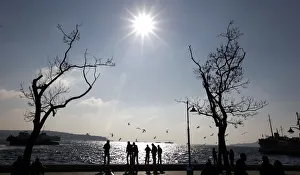 People enjoy sunny weather at a park by the Bosphorus in Istanbul People enjoy sunny weather at a park by the Bosphorus in Istanbul