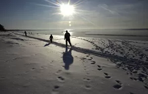 Images Dated 29th January 2012: People enjoy sunny weather by the seaside in Saulkrasti