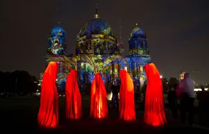 People look at a light installation during the opening day of the Festival of Light People look at a light installation during the opening day of the Festival of Light