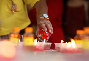 People pray during the Lunar New Year celebrations at Wat Mangkon Kamalawat in Chinatown People pray during the Lunar New Year celebrations at Wat Mangkon Kamalawat in Chinatown