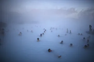 People relax in one of the Blue Lagoon hot springs near the town of Grindavik People relax in one of the Blue Lagoon hot springs near the town of Grindavik