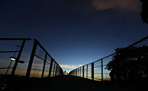 People walk on a catwalk over the Brasil avenue during a 48-hour bus strike in Rio de People walk on a catwalk over the Brasil avenue during a 48-hour bus strike in Rio de