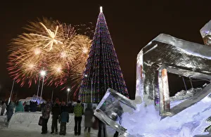 People watch fireworks lighting the sky during Orthodox Christmas celebrations in People watch fireworks lighting the sky during Orthodox Christmas celebrations in