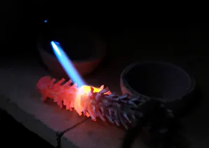 A piece of silver is melted at the Villa Imperial de Potosi jewellery in La Paz A piece of silver is melted at the Villa Imperial de Potosi jewellery in La Paz