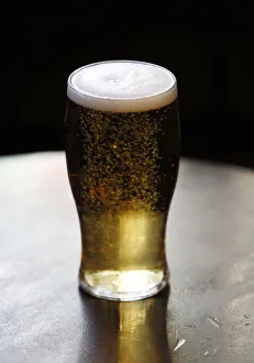 A pint is seen on a table in a pub in London A pint is seen on a table in a pub in London