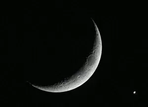 Images Dated 18th June 2007: The planet Venus is seen after being eclipsed by the crescent moon, as seen from Amman