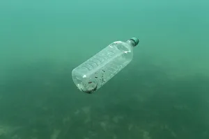 A plastic bottle is seen floating in an Adriatic sea of the island Mljet A plastic bottle is seen floating in an Adriatic sea of the island Mljet
