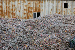 Plastic bottles are stocked to be recycled at the Weeco plastic recycling factory at the Plastic bottles are stocked to be recycled at the Weeco plastic recycling factory at the