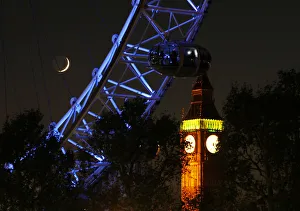 A pod from the London Eye is seen in front of Big Ben at the Houses of Parliament A pod from the London Eye is seen in front of Big Ben at the Houses of Parliament
