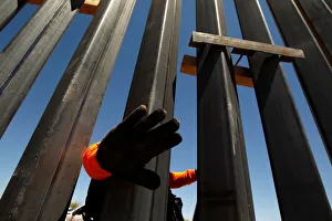 Juarez Gallery: A private security guard blocks the camera to avoid being photographed at a new section