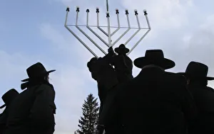 Rabbi Gallery: Rabbis inspect the setting-up of a large Menorah in front of the Brandenburg Gate in