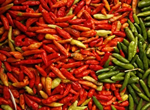 Red and green chillies are seen at a traditional market in Jakarta Red and green chillies are seen at a traditional market in Jakarta