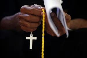Indonesia Gallery: A Roman Catholic worshipper prays at a church during Holy Week in Larantuka on Flores