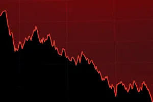 A screen displays a chart of the Dow Jones Industrial Average during trading on the floor A screen displays a chart of the Dow Jones Industrial Average during trading on the floor