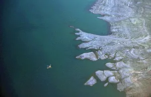 A sightseeing helicopter flies over Lake Mead on the outskirts of Boulder City A sightseeing helicopter flies over Lake Mead on the outskirts of Boulder City