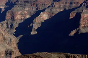 A sightseeing helicopter flying through the west rim of the Grand Canyon is seen A sightseeing helicopter flying through the west rim of the Grand Canyon is seen