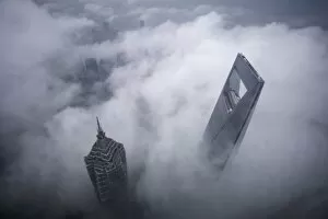 Weather Gallery: Skyscrapers Shanghai World Financial Center and Jin Mao Tower are seen during heavy