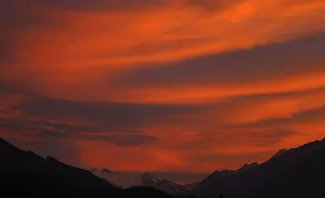 The snow covered Stubaier Glacier mountains are seen during sunset in Innsbruck The snow covered Stubaier Glacier mountains are seen during sunset in Innsbruck