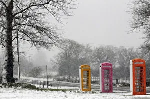 Snow sticks to the side of telephone boxes at a salvage yard near Nutts Corner in Co Snow sticks to the side of telephone boxes at a salvage yard near Nutts Corner in Co