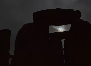 Solar Eclipse Gallery: The solar eclipse is seen over Stonehenge on Salisbury Plain, Salisbury, southern England