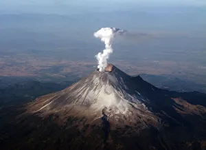 Puebla Gallery: Steam rises from Mexicos Popocatepetl volcano in Puebla