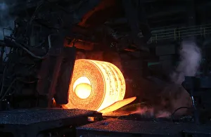 A steel coil is unrolled on the line at the Novolipetsk Steel PAO steel mill in Farrell A steel coil is unrolled on the line at the Novolipetsk Steel PAO steel mill in Farrell